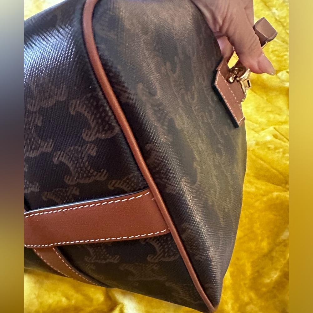 MEDIUM TRAVEL BAG IN TRIOMPHE CANVAS AND CALFSKIN - Picture 9 of 16